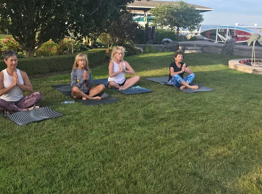 Beach yoga class on Lake St. Clair